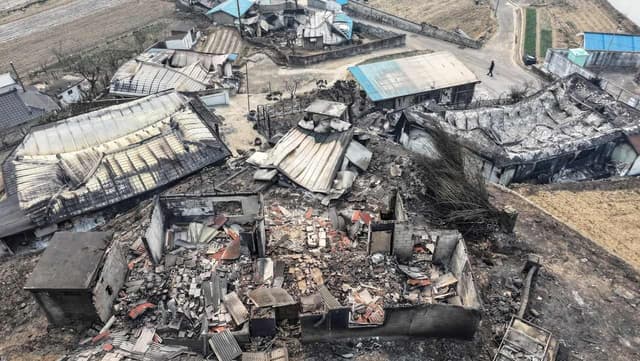 Helicopter pilot among dead as S.Korea battles fires