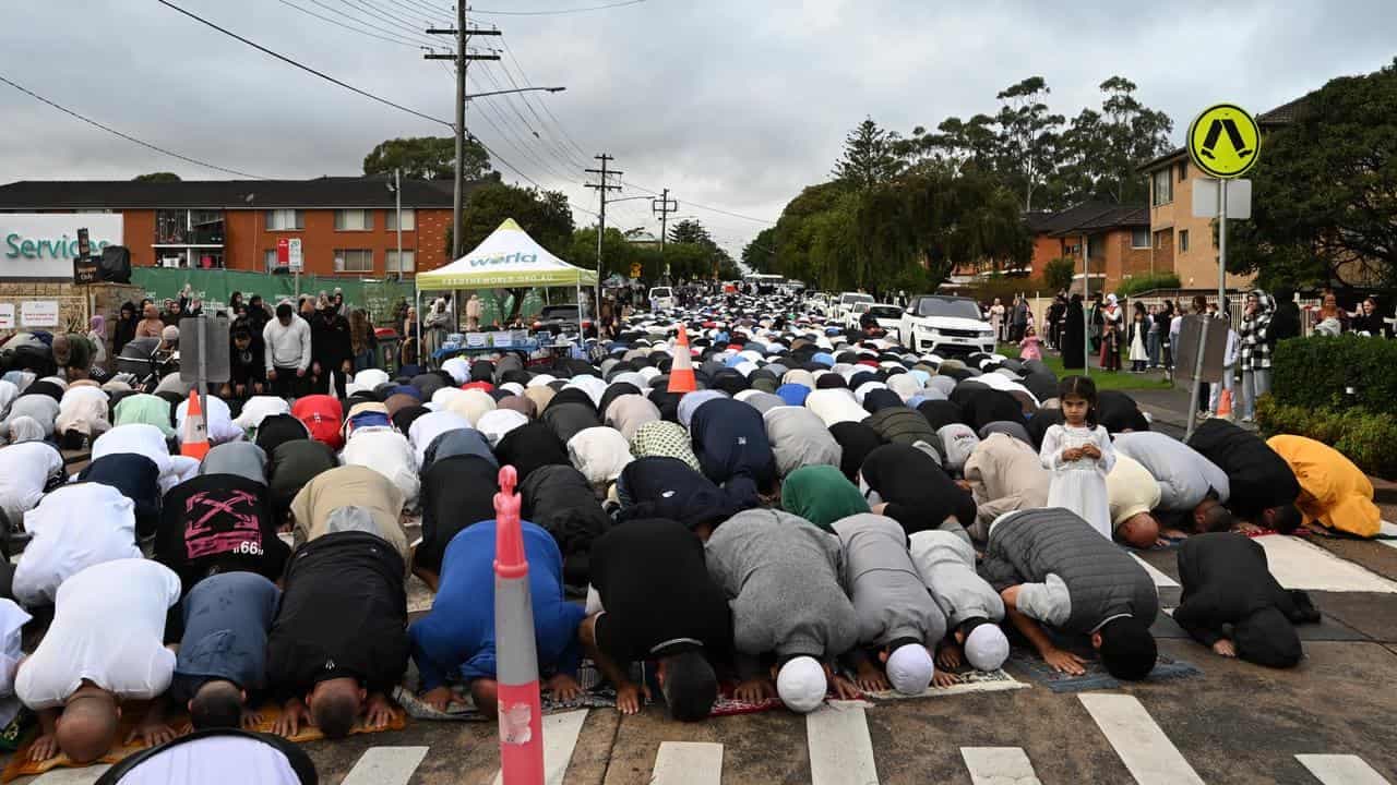 Muslims mark Eid 'tinged with sadness and joy'