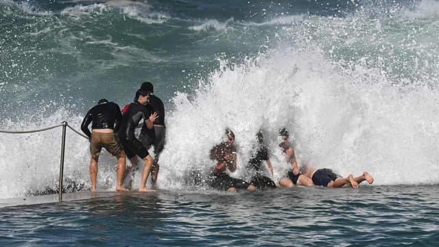 Famous beaches closed as monster swells lash coast