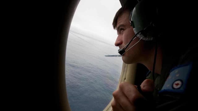 Search for flight MH370 suspended due to bad weather