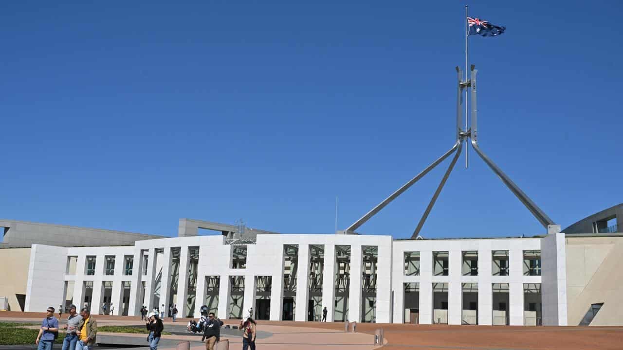 Pledge to public servants as jobs cut fight flares