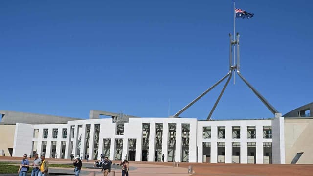 Pledge to public servants as jobs cut fight flares