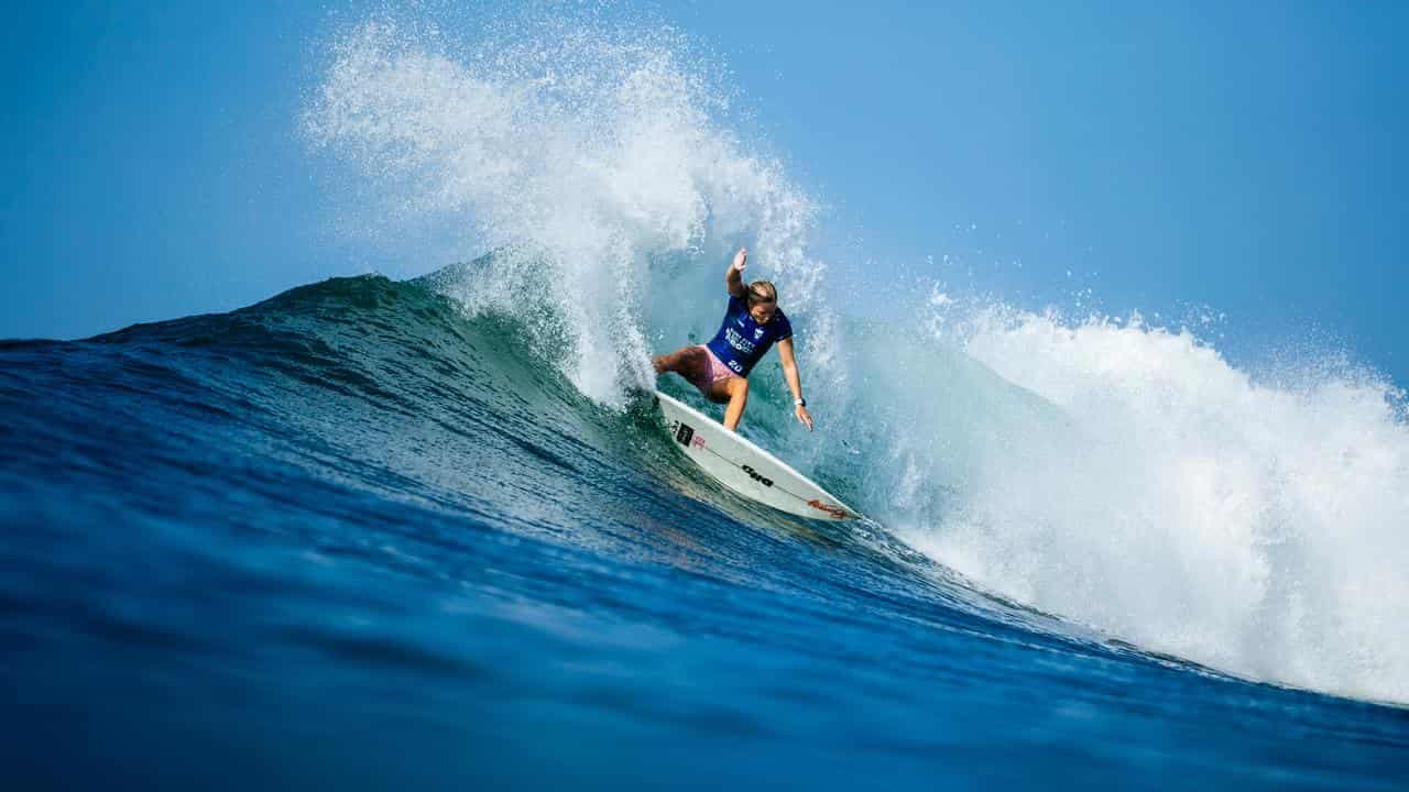 'Bittersweet' Nichols surfs away from sister's wedding