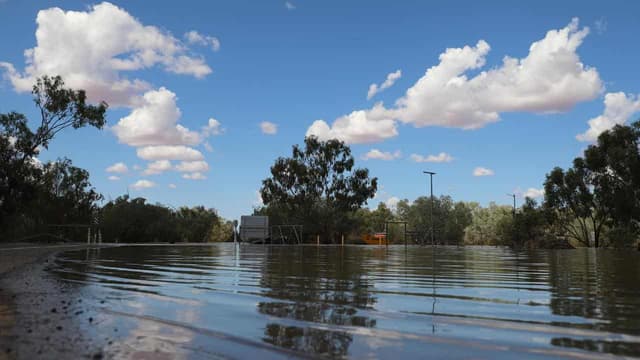 Flood-stricken town pledges survival as locals unite