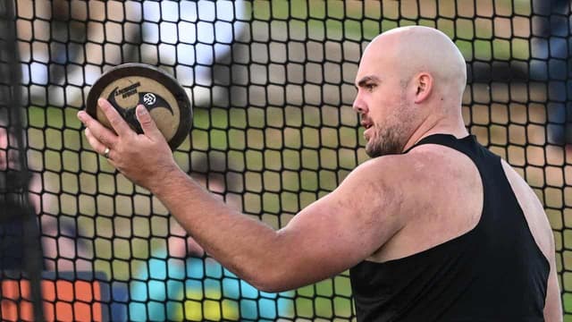 Alekna and Denny both smash discus world record