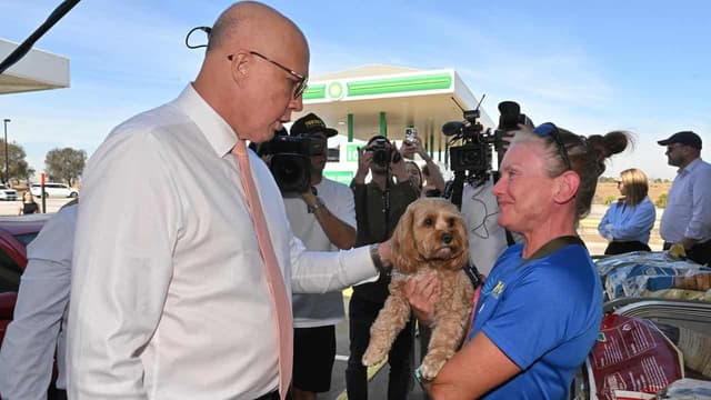 Puppies and petrol stations as Dutton keeps on trucking