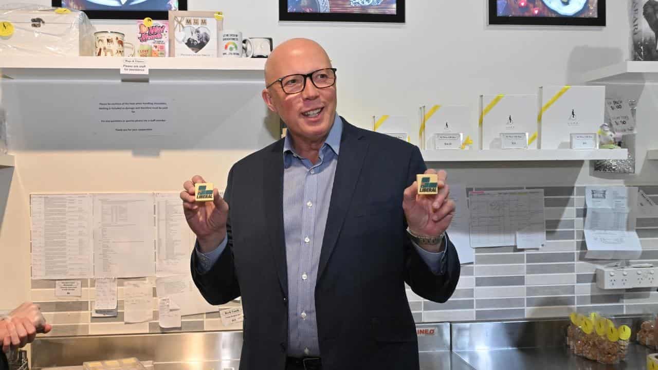 Dutton shows sweeter side in chocolate shop stop