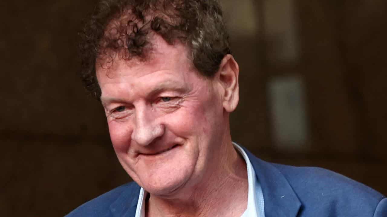 Ex-AFL player agent charged over alleged police threats