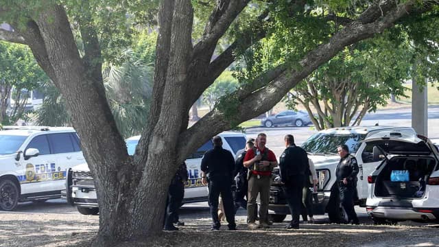 Deputy sheriff's son shoots two dead at US university