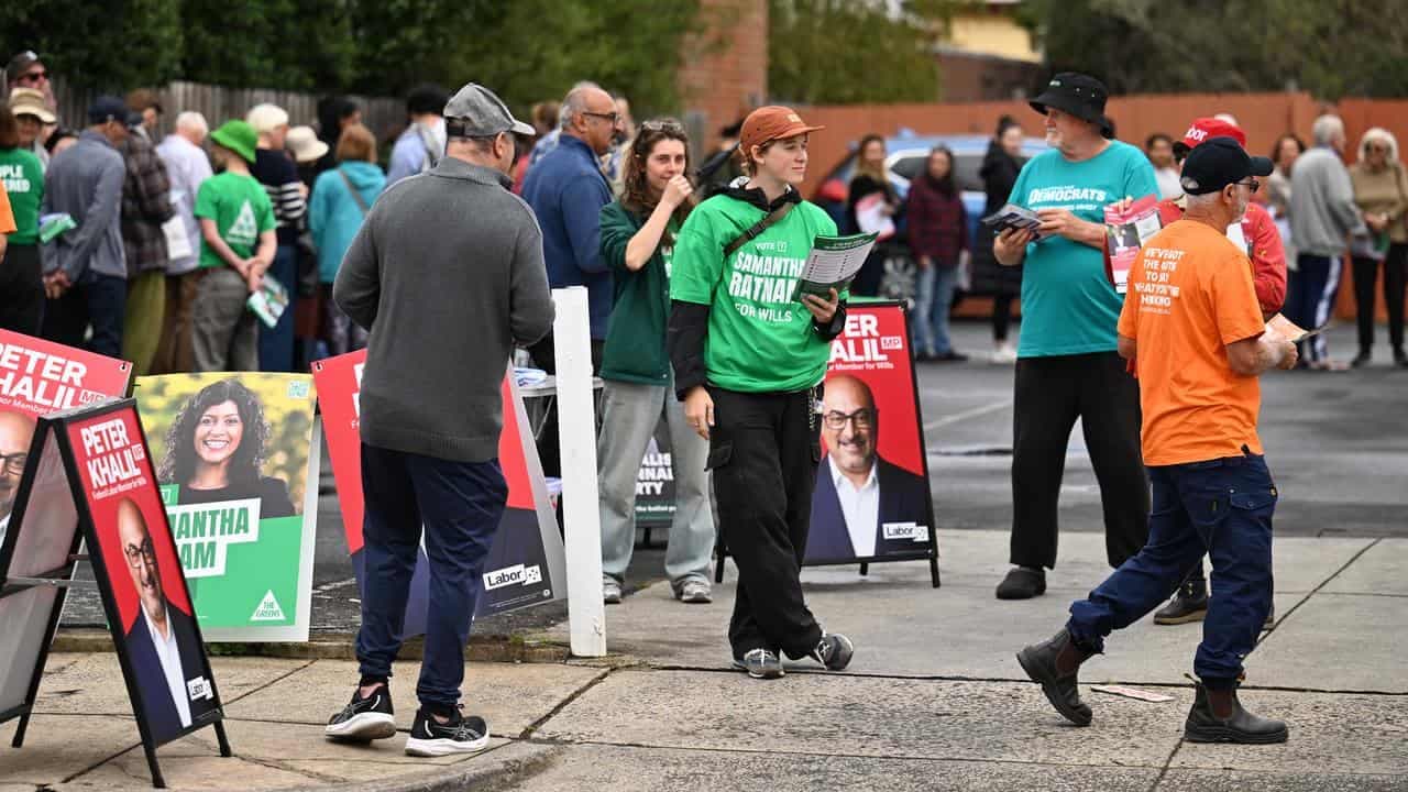 Eager voters ditch tradition, hit the ballot box early