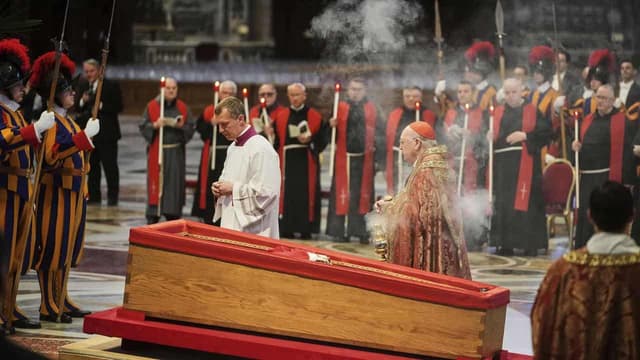 Pope's body placed in basilica after solemn procession