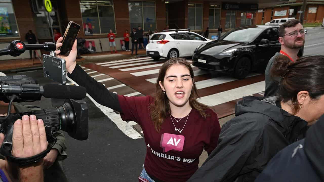 'Complicit in genocide': PM heckled by senate candidate