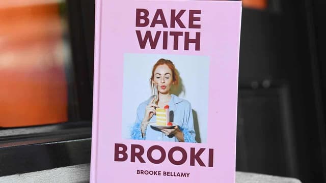 Viral baker maintains innocence amid author food fight
