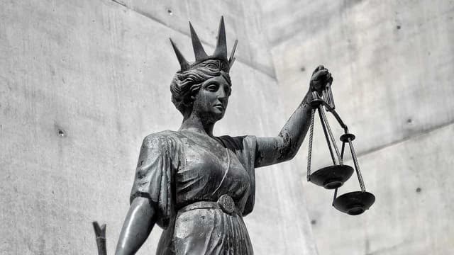 Man accused of overseas child abuse to stay behind bars