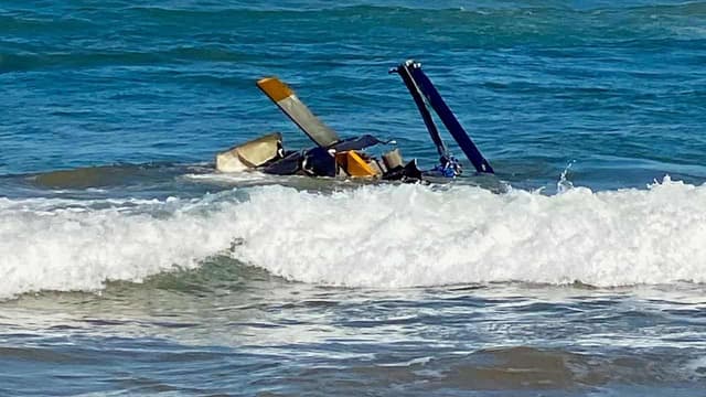 Three people rescued from seaside helicopter crash