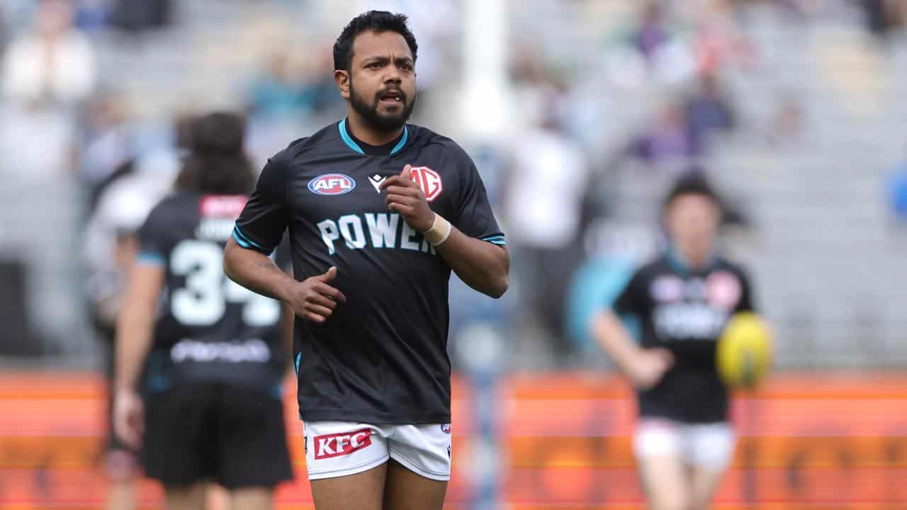 Power say racism is 'persistent' after AFL bans Rioli