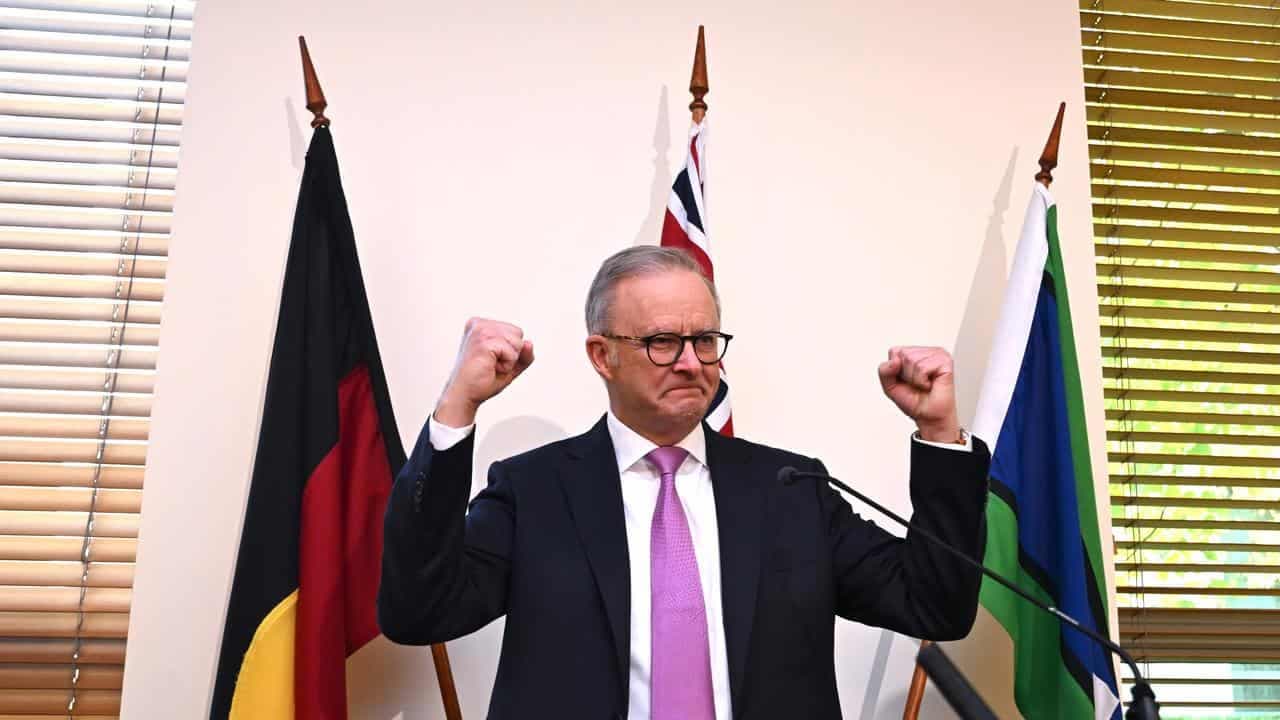 PM rallies troops, urges caucus to focus on Australians