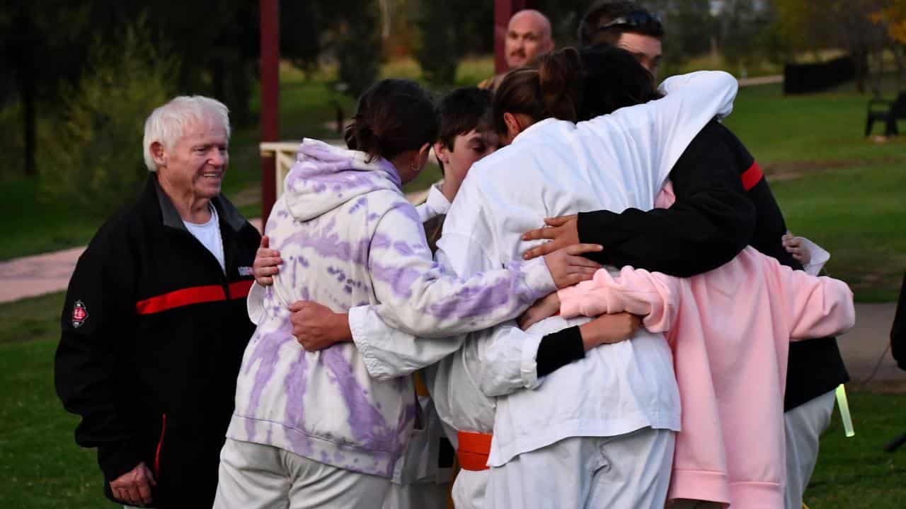 Town reels as grandmother faces court over boys' deaths