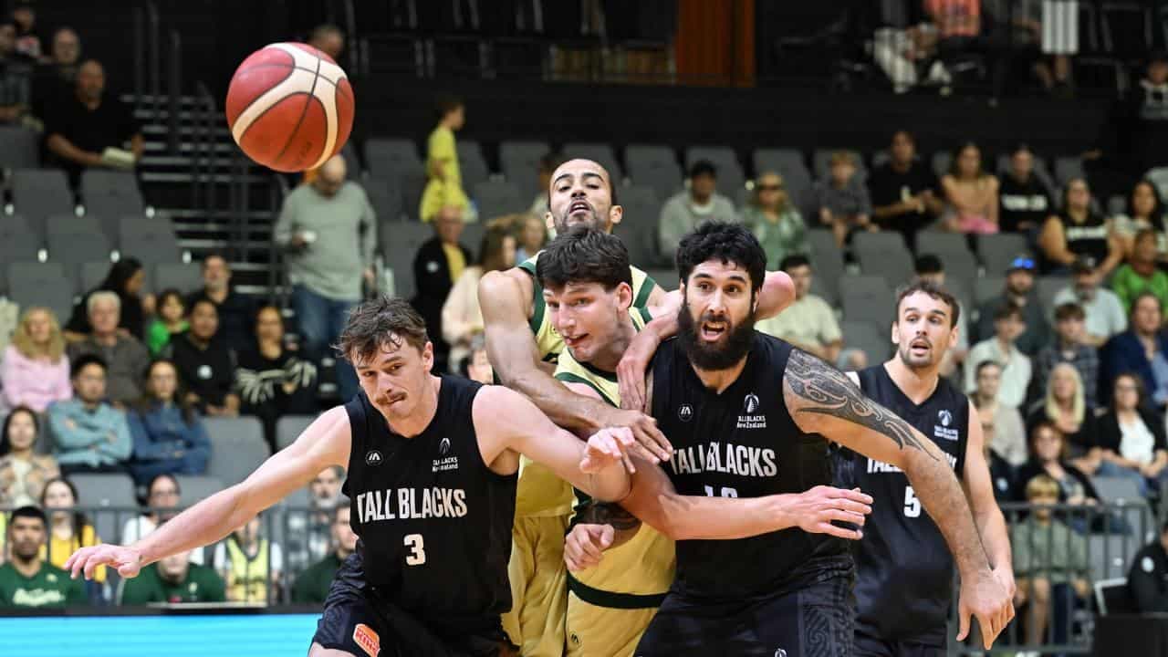 Boomers' comeback falls short, Opals outclass NZ