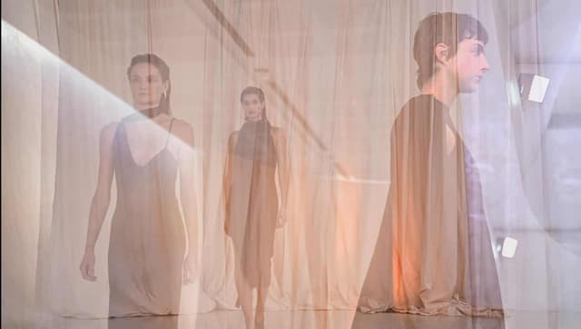 Designer brings beach to the runway in playful show