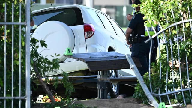 Mother hit with charges over fatal primary school crash