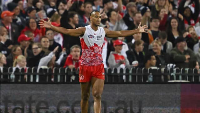 Swans duo banned over high hits on Blues defenders