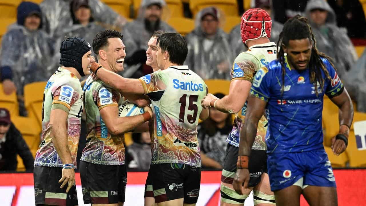 Reds' romp soured by late injury to Wallabies star