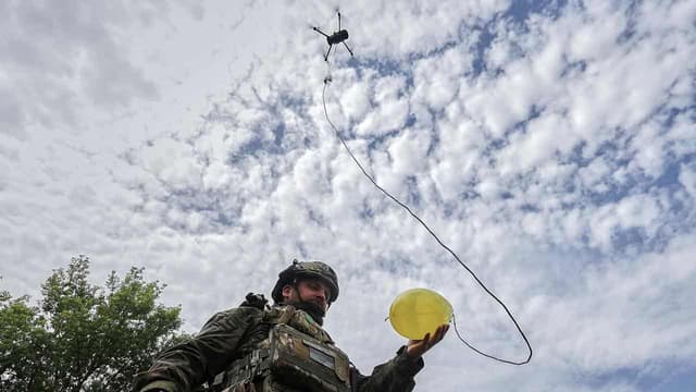 Two dead in Russian attacks on Ukraine, talks uncertain