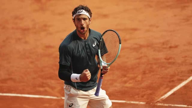 Musetti survives disqualification row to reach semis