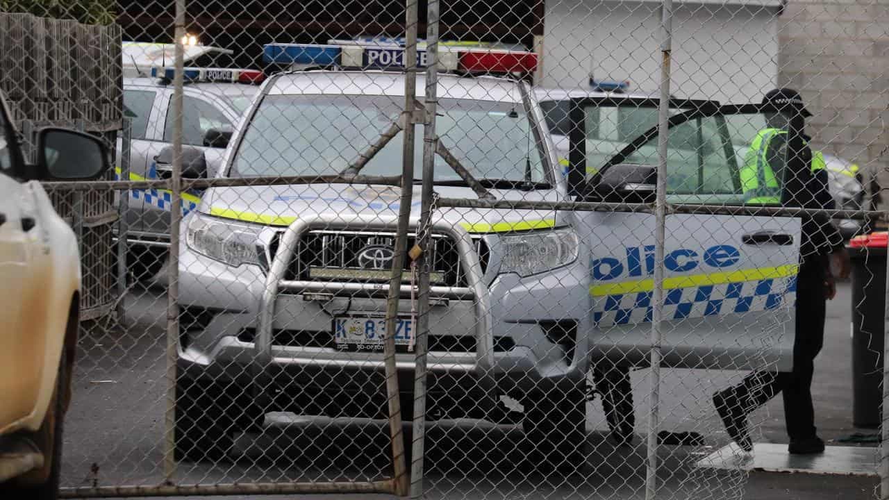 CCTV clues after body found in bin at shopping strip