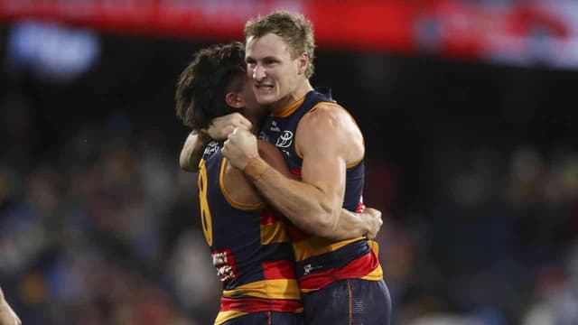 Comeback Crows' late surge sinks Brisbane in thriller