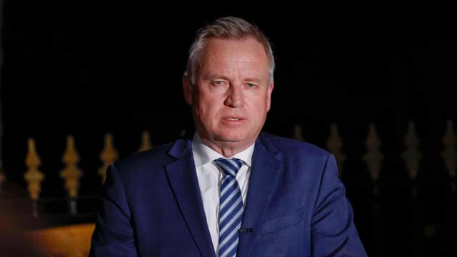 Liberals back embattled premier, election call looms