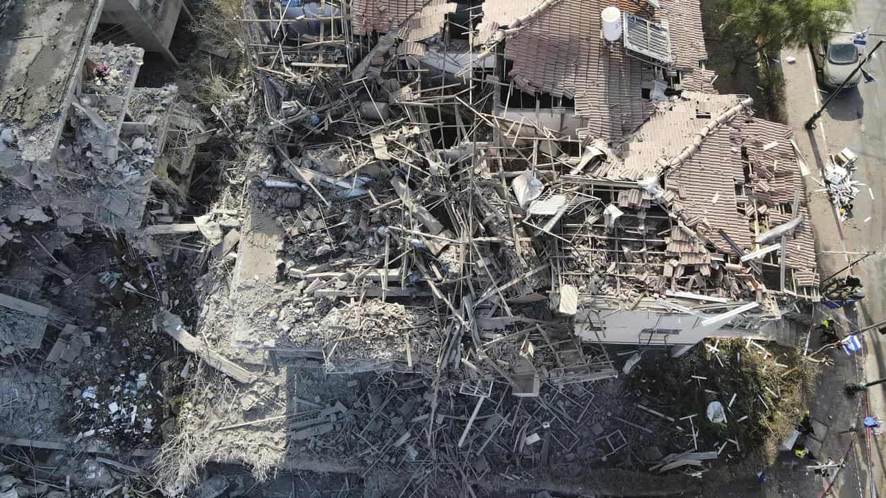 'Tehran will burn', Israel warns Iran after attacks