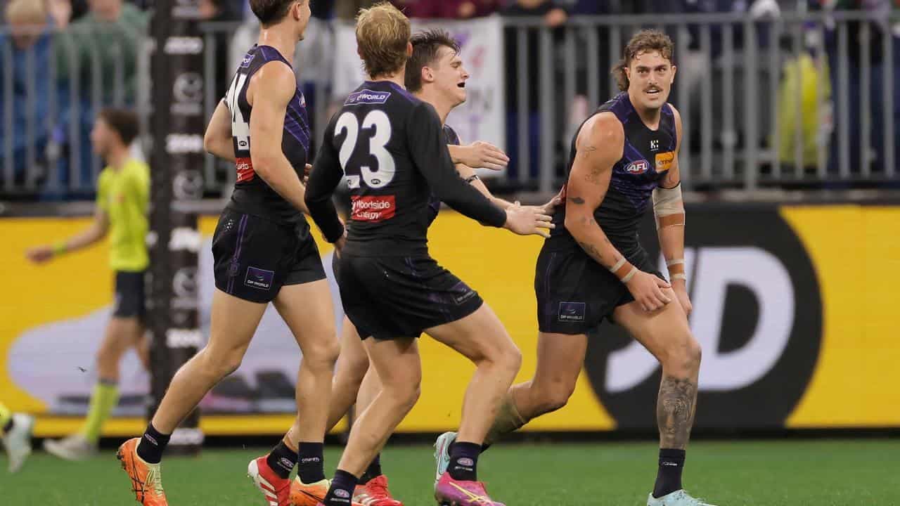 Freo survive major scare as Roos comeback falls short