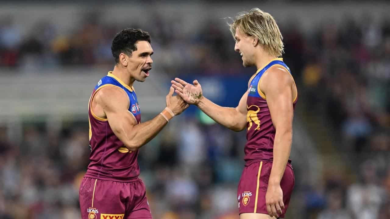 Lions back flag duo to fire in huge AFL clash