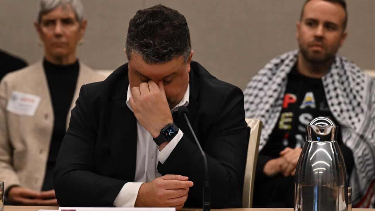 Staff front 'kangaroo court' probe after arrest threat