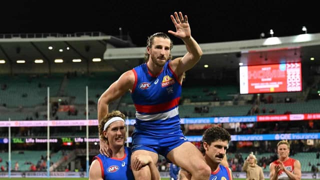 Dogs celebrate Bont milestone with tense win over Swans
