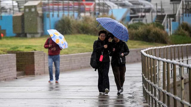 Major dam to likely spill as 'bomb cyclone' hits coast