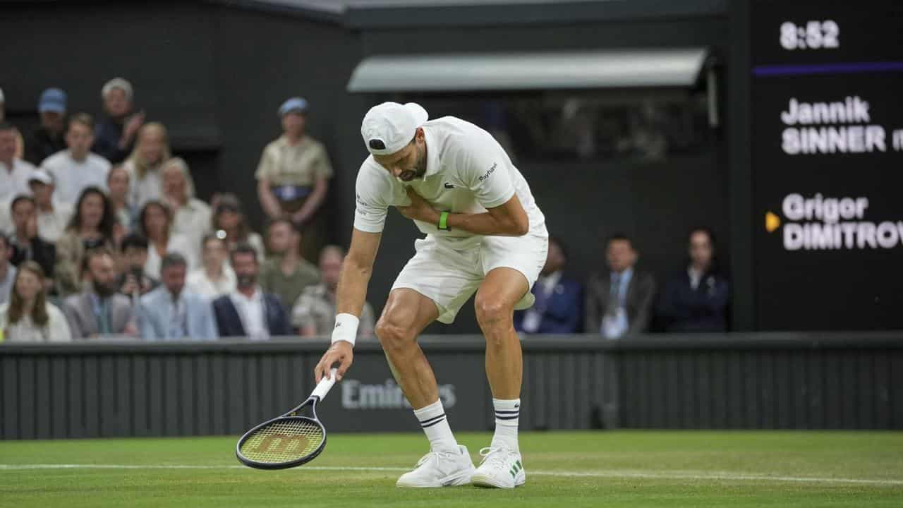 Injury rescues world No.1 from early Wimbledon exit