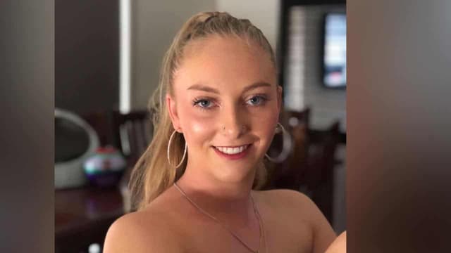 Woman's work locked down after killer's alleged threat