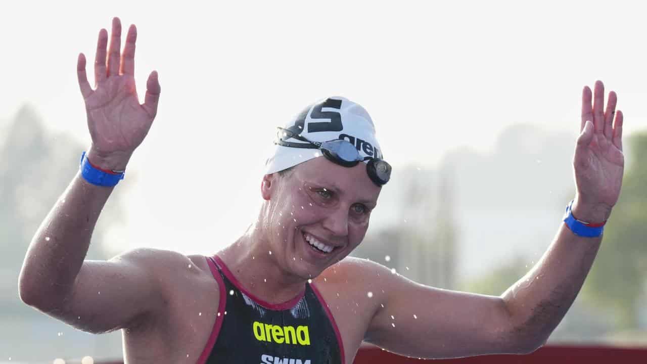 Johnson wins first Australian 10km world swim title