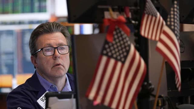 Wall Street ends higher after choppy trading