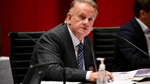 Latham denies breaking law, rules over ex's allegations