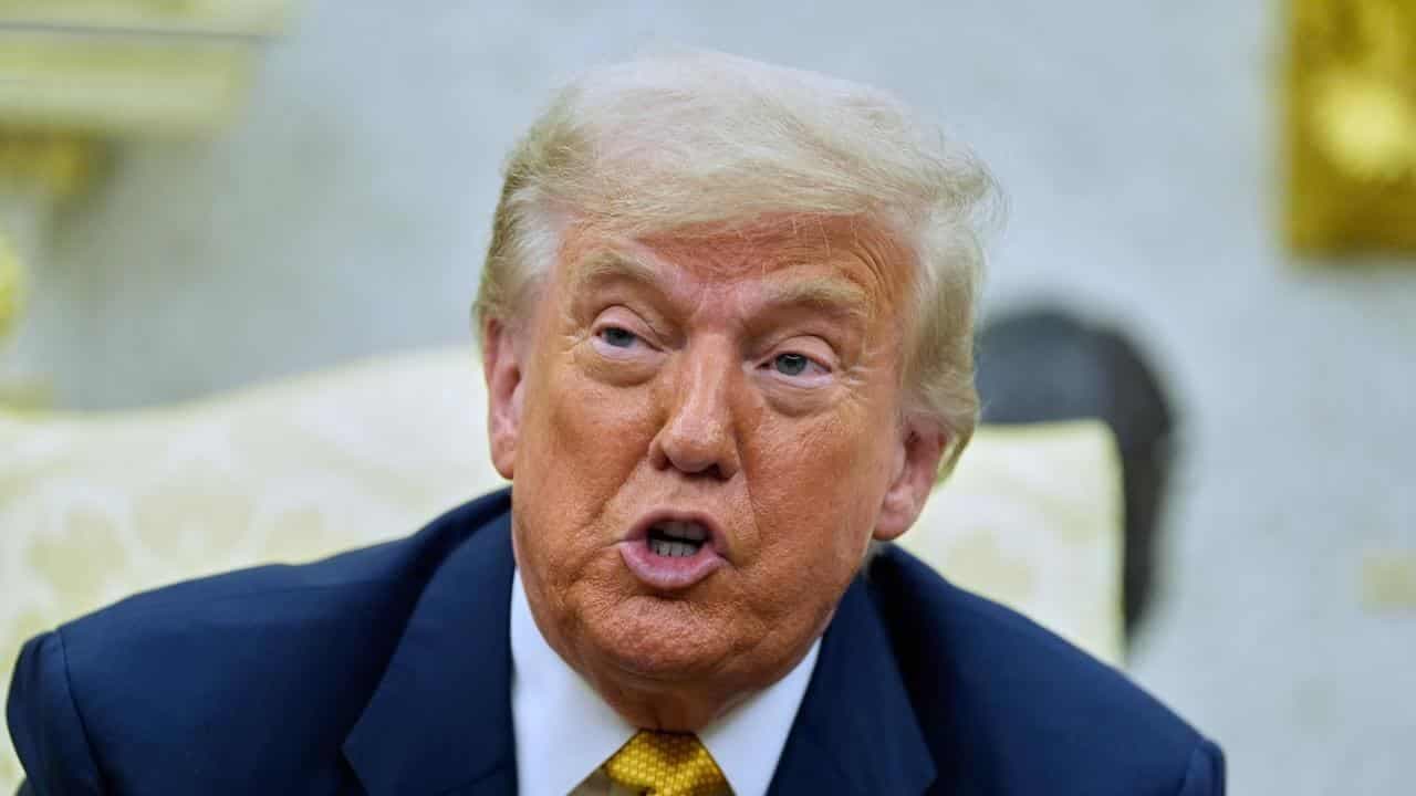 Trump's name on 2003 birthday letter to Epstein: report