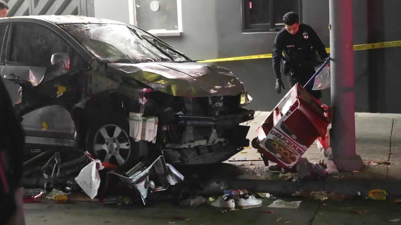 Dozens injured as car drives into crowd in Los Angeles