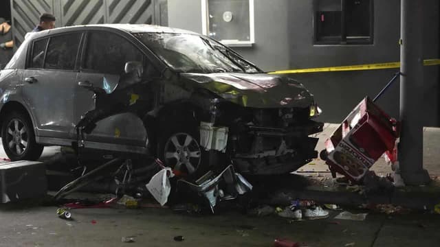 Man whose car hit US crowd was shot, attacked: police