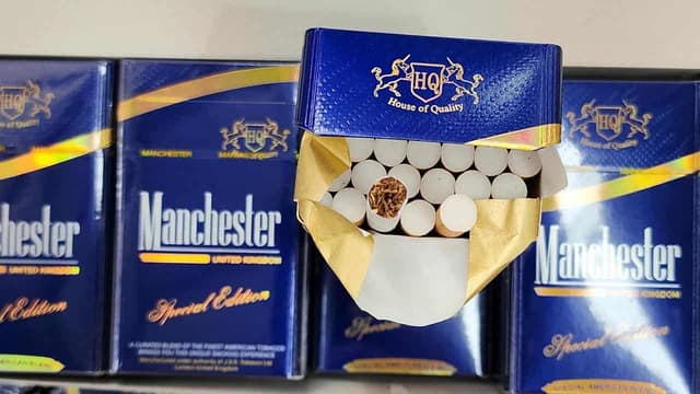 Vows to 'throw the book' at black market tobacco shops