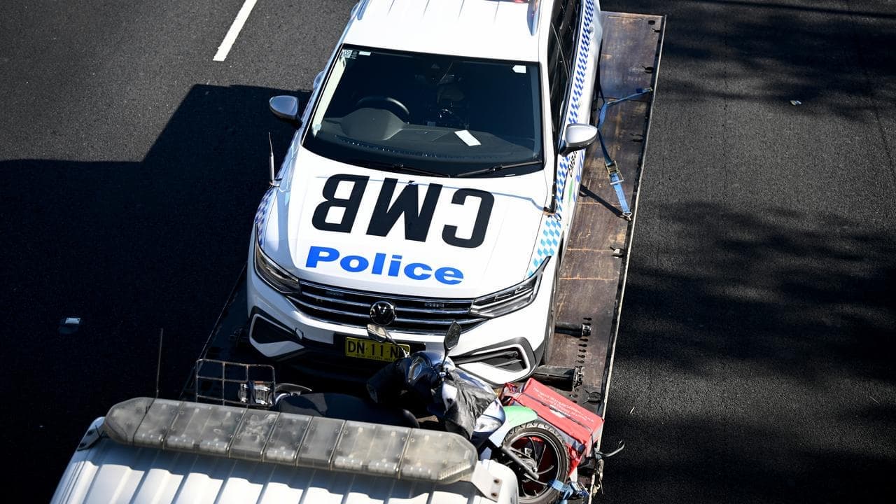 Cop car in multi-car motorway crash, scooter rider dead