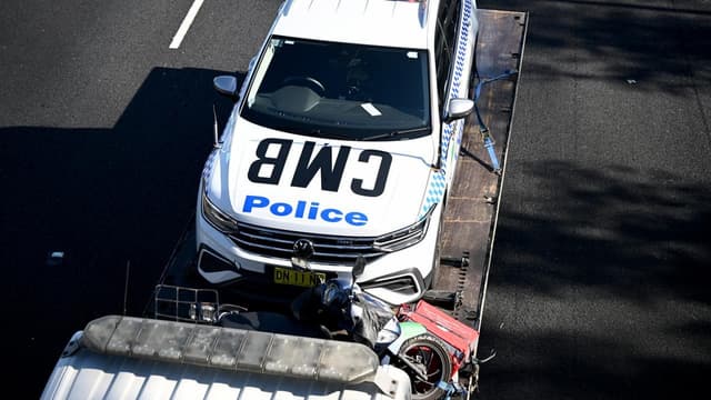 Cop car in multi-car motorway crash, scooter rider dead