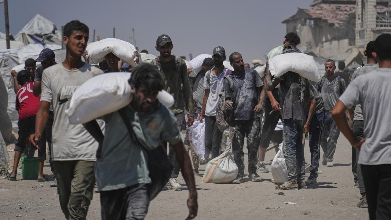 Israeli strikes in Gaza as some aid restrictions eased